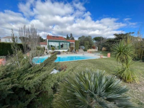 Gorgeous 5 bedroom villa with air con, heated pool and garden for 12